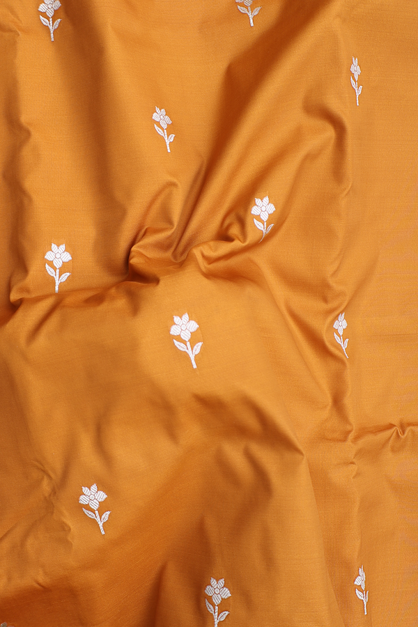 Banarasi Silk Saree In Ochre Orange With Floral Buttas