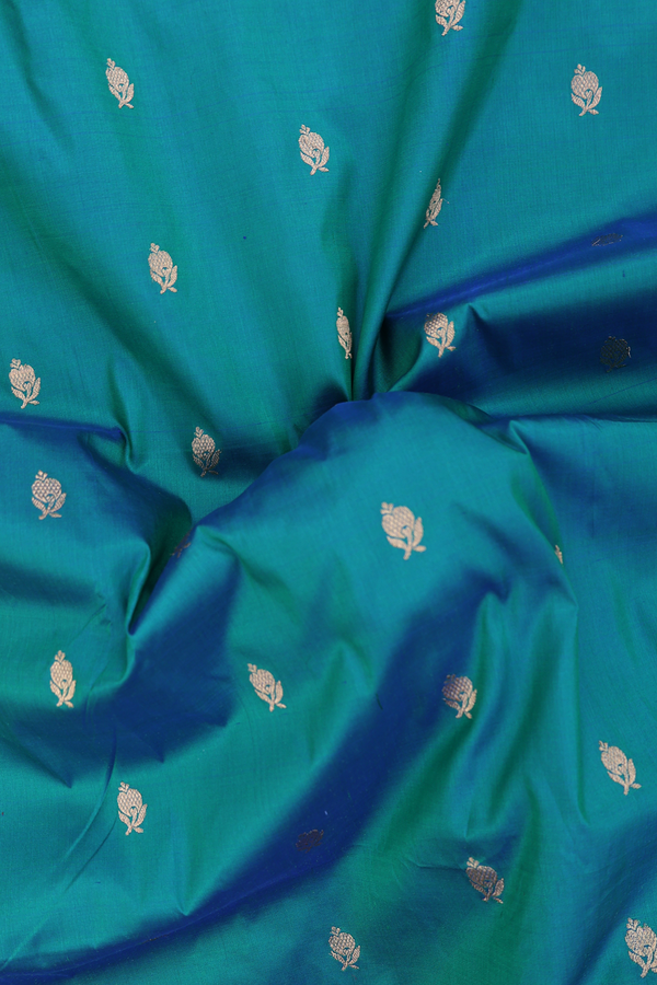 Banarasi Silk Saree In Peacock Blue With Floral Buttas