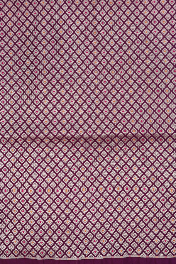 Banarasi Silk Saree In Plum Purple With Floral Buttas