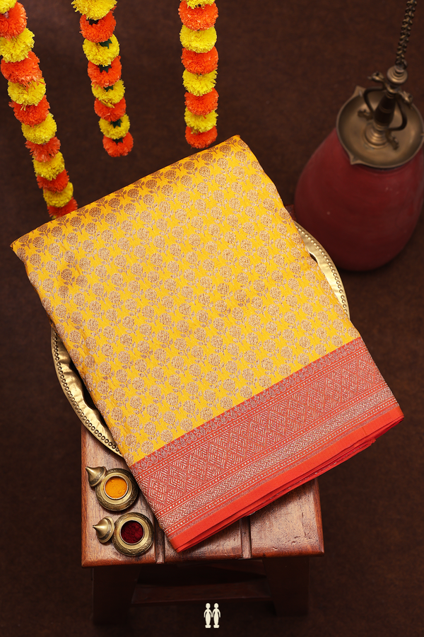 Banarasi Silk Saree In Saffron Yellow With Floral Design