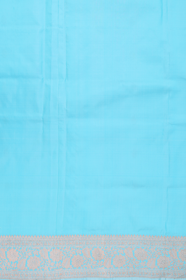 Banarasi Silk Saree In Sky Blue With Zari Buttas