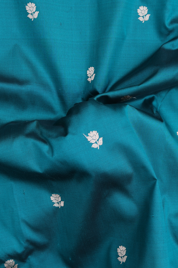 Banarasi Silk Saree In Teal Green With Floral Buttas
