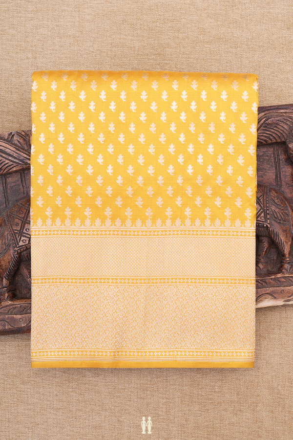 Banarasi Silk Saree In Saffron Yellow With Floral Buttis