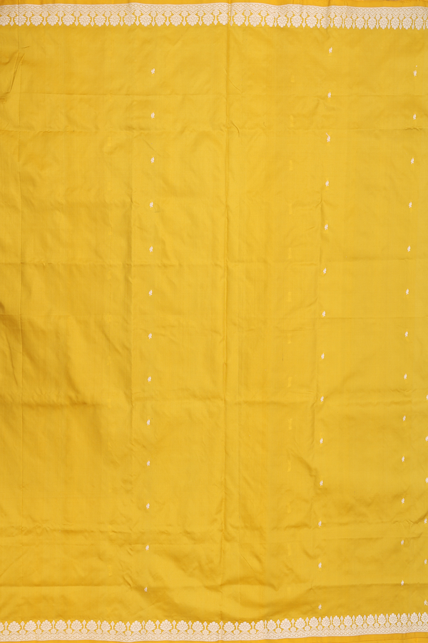 Banarasi Silk Saree In Yellow With Zari Buttas