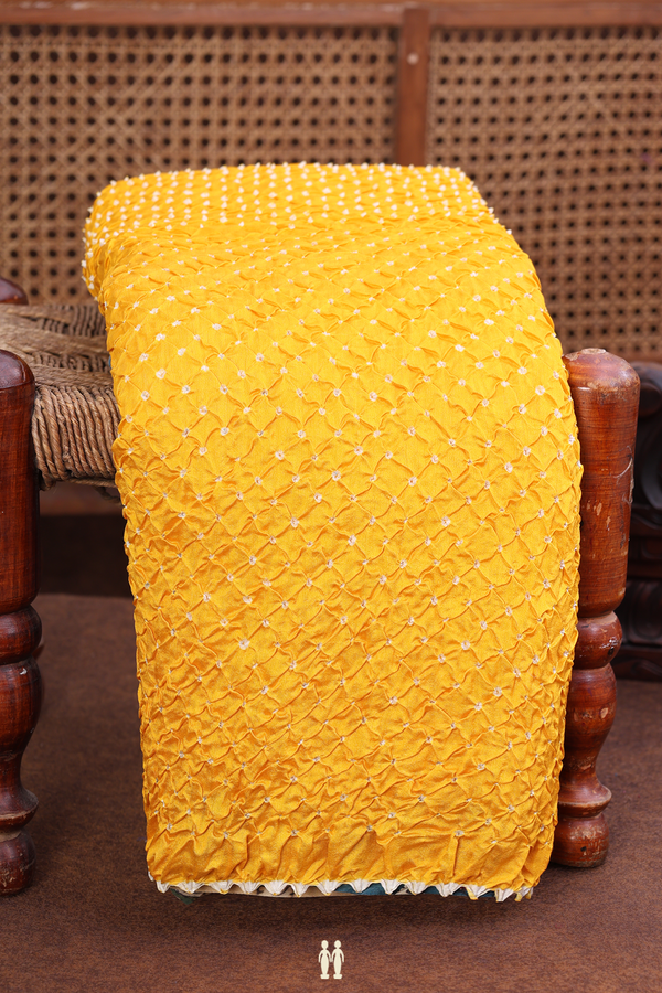 Bandhani Silk Saree In Saffron Yellow With Tie And Dye Design