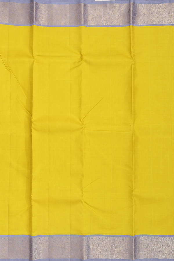 Kanchipuram Silk Saree In Plain Yellow With Korvai Border