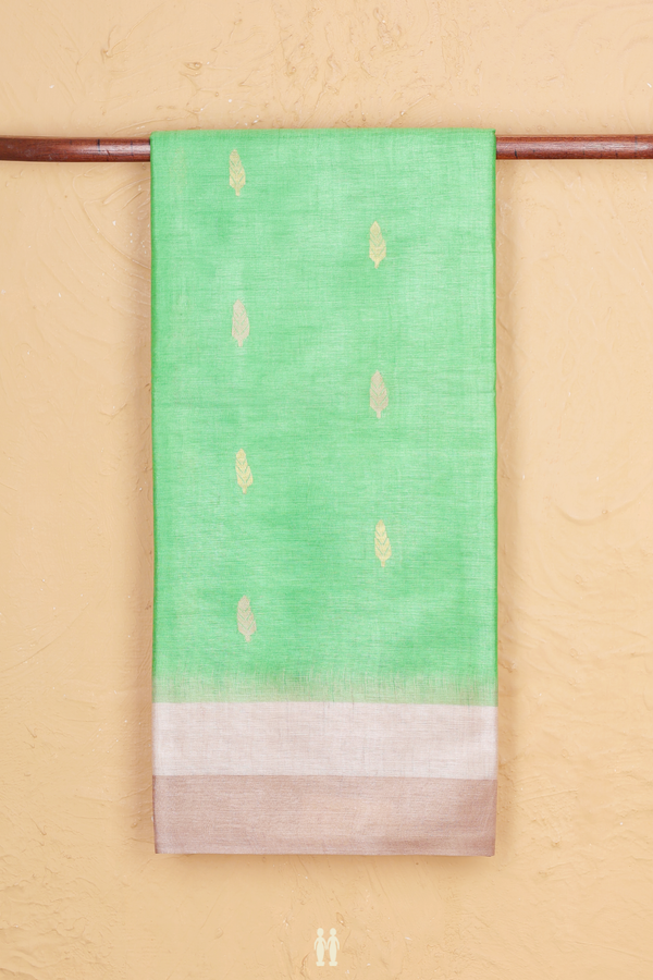 Tussar Silk Saree In Green With Zari Buttas