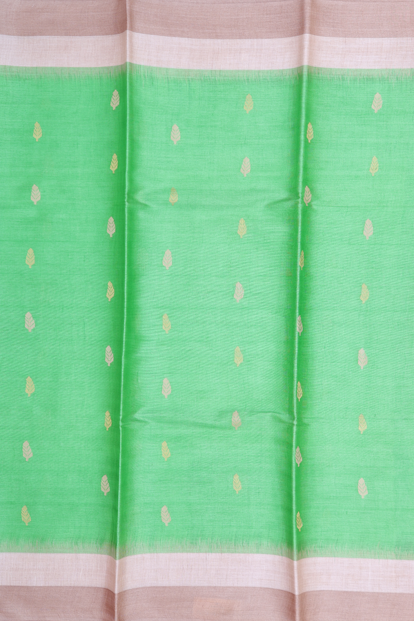 Tussar Silk Saree In Green With Zari Buttas