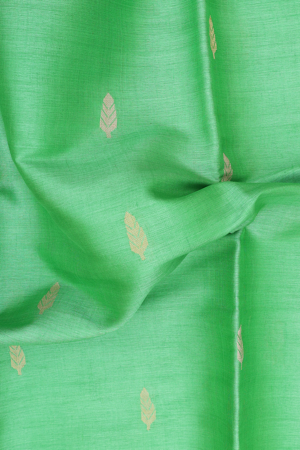 Tussar Silk Saree In Green With Zari Buttas