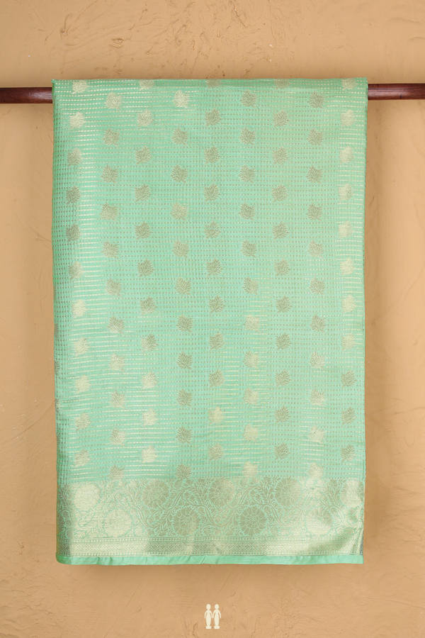 Tussar Silk Saree In Pale Green With Floral Buttas