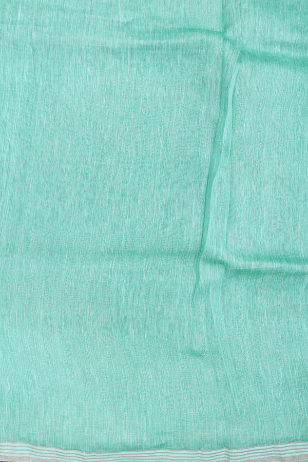 Linen Saree In Aqua Green With Floral Buttas