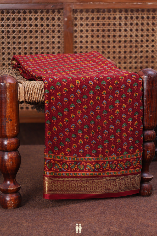 Crepe Saree In Crimson Red With Floral Buttas