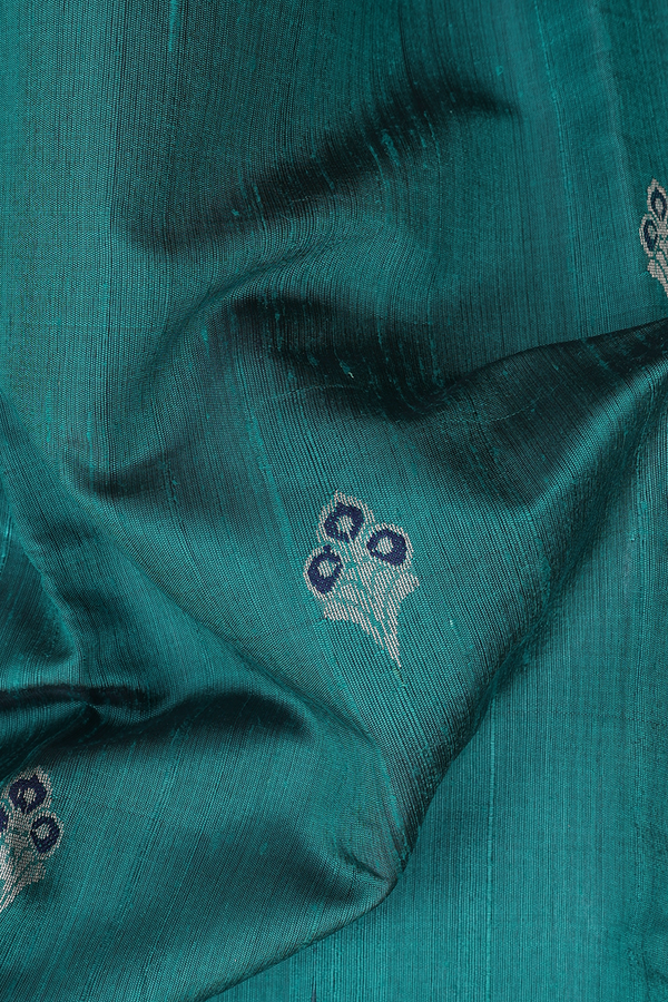 Jute Saree In Teal Blue With Floral Buttas