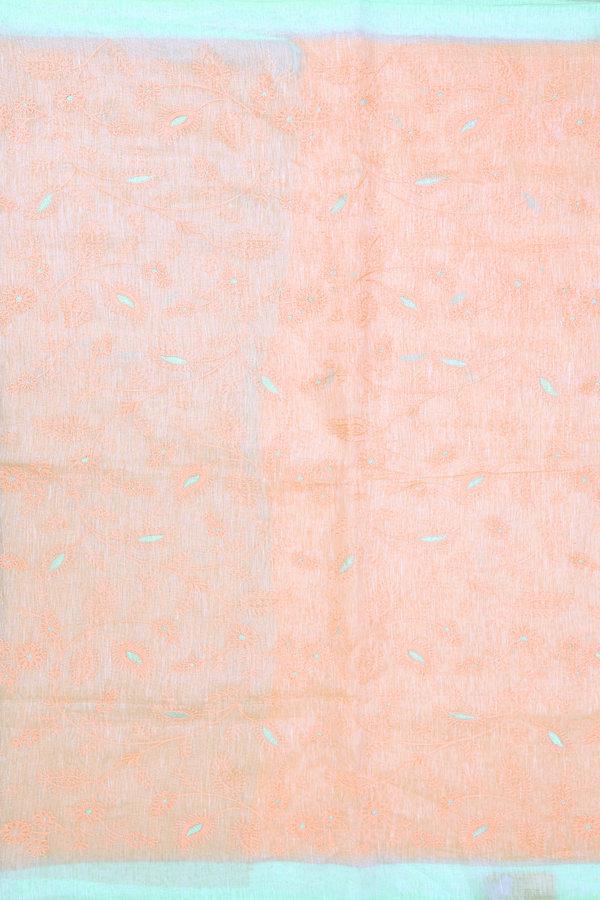 Linen Saree In Light Orange With Floral Embroidered Design
