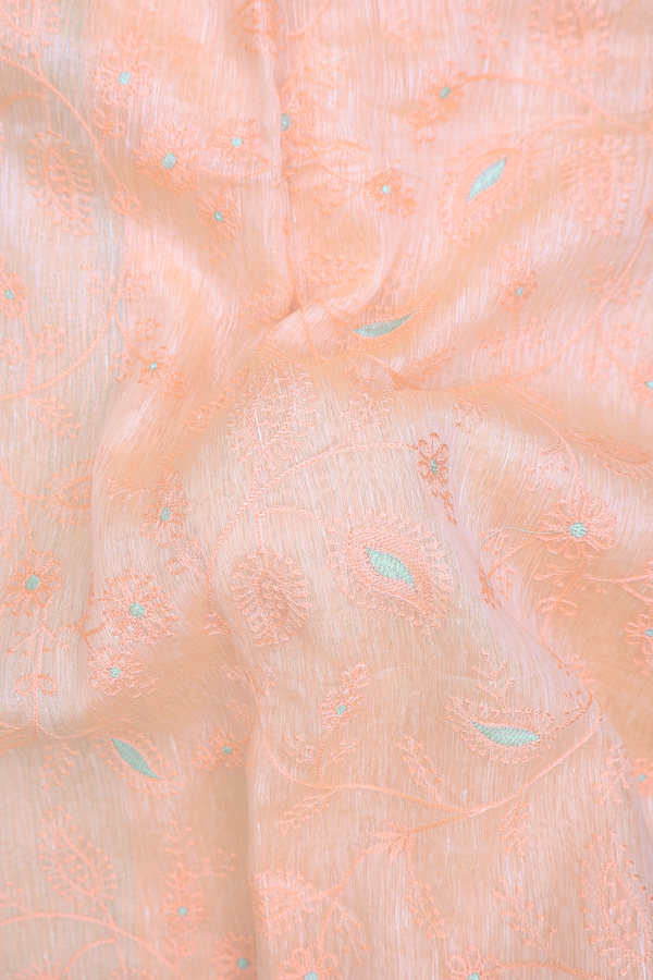Linen Saree In Light Orange With Floral Embroidered Design