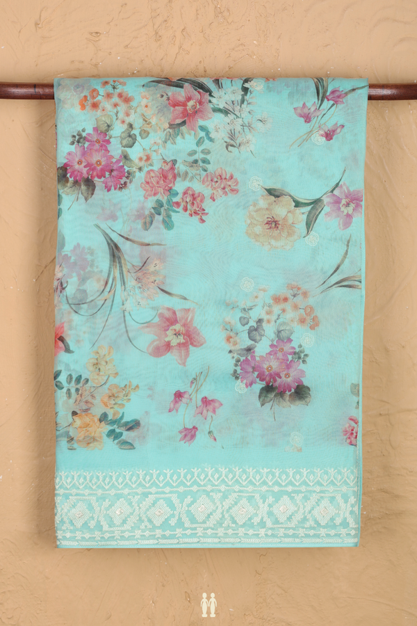 Organza Silk Saree In Light Blue With Floral Design