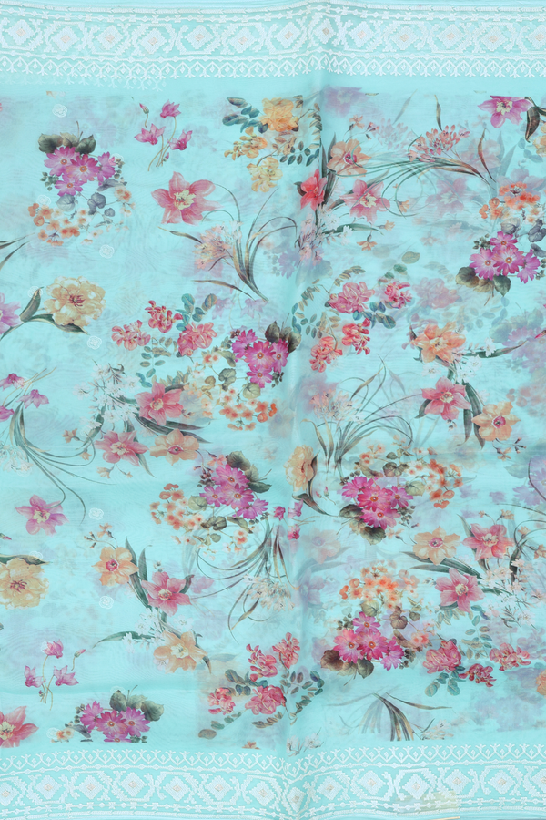 Organza Silk Saree In Light Blue With Floral Design
