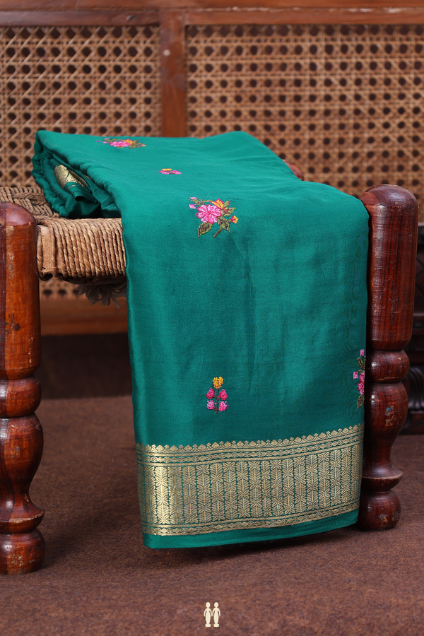 Crepe Saree In Peacock Green With Floral Buttas