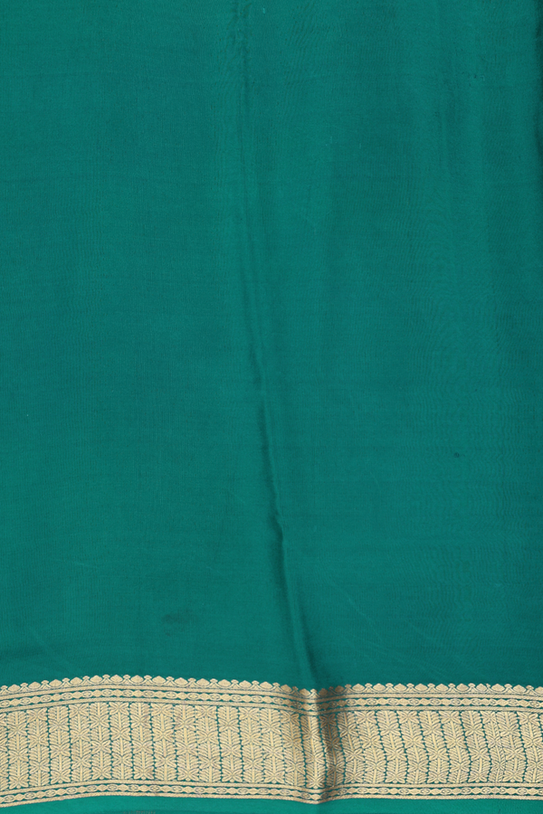 Crepe Saree In Peacock Green With Floral Buttas