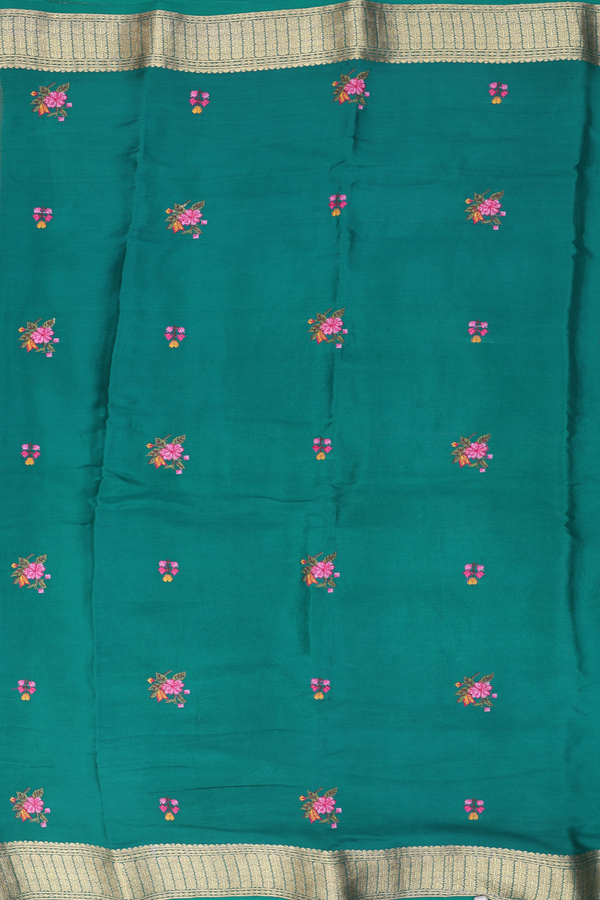 Crepe Saree In Peacock Green With Floral Buttas