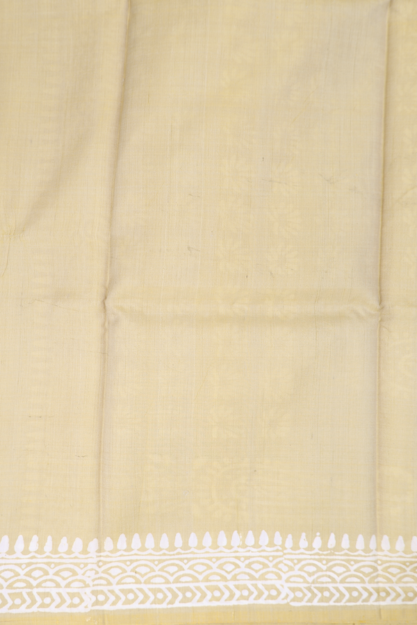 Printed Silk Saree In Pastel Brown With Floral Motifs