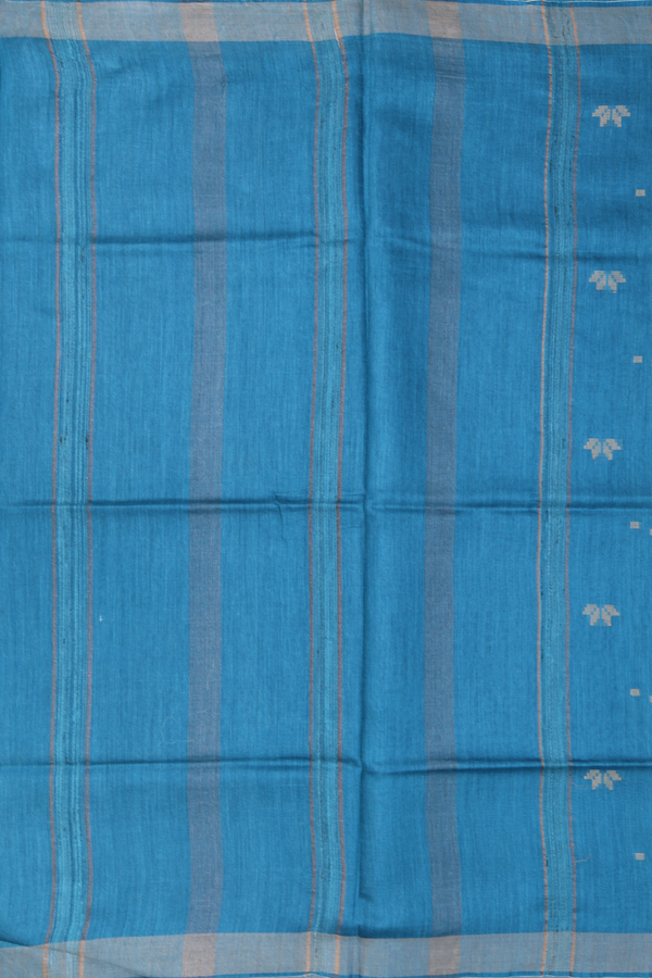 Tussar Silk Saree In Teal Blue With Zari Buttas