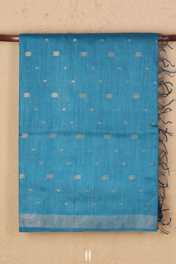 Tussar Silk Saree In Teal Blue With Zari Buttas