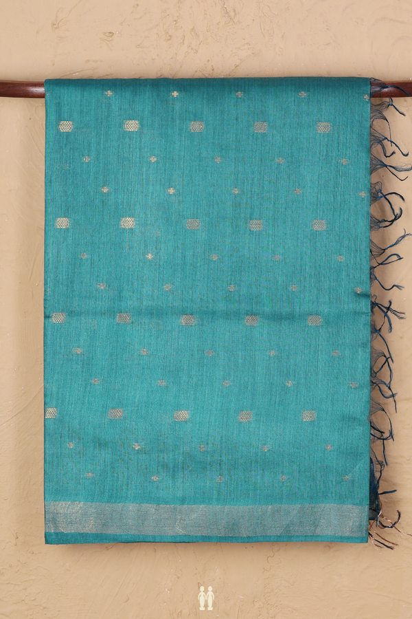 Tussar Silk Saree In Teal Blue With Zari Buttas