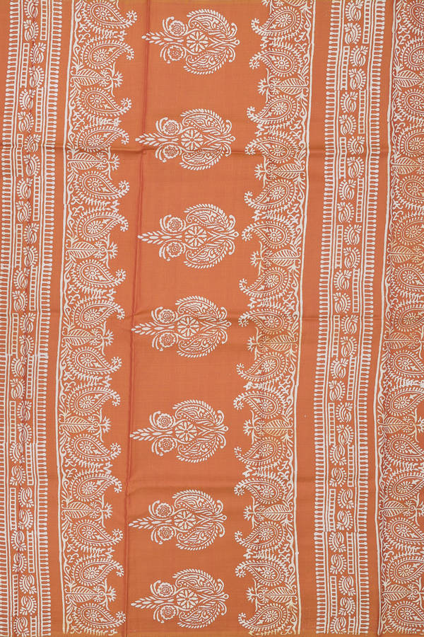 Printed Silk Saree In Rust Orange With Paisley Motifs