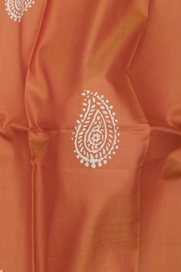 Printed Silk Saree In Rust Orange With Paisley Motifs