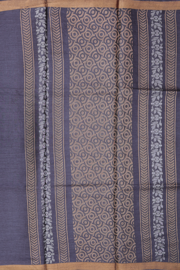 Tussar Silk Saree In Charcoal Grey With Zari Buttas