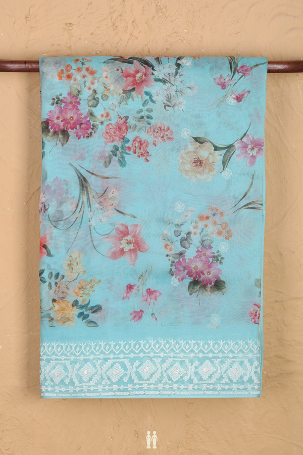 Organza Silk Saree In Light Blue With Floral Design