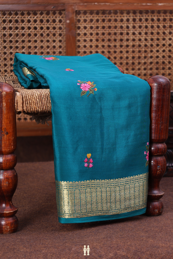 Crepe Saree In Peacock Green With Floral Buttas