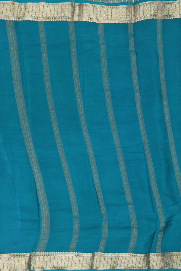 Crepe Saree In Peacock Green With Floral Buttas
