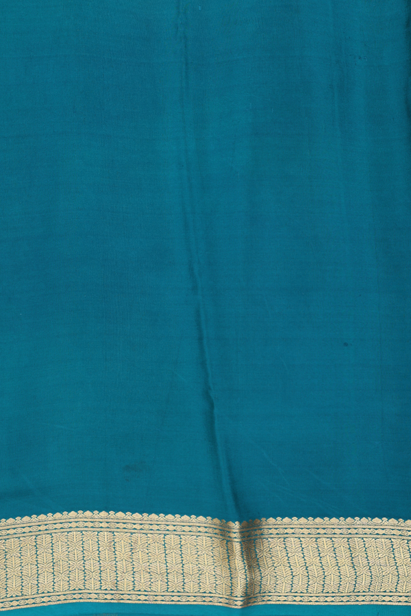 Crepe Saree In Peacock Green With Floral Buttas