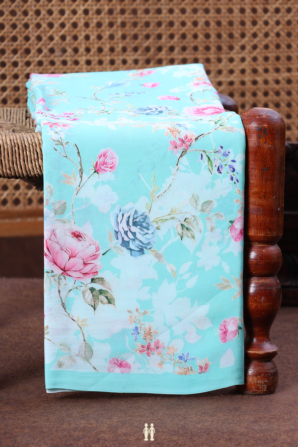Crepe Saree In Pastel Blue With Floral Printed Design