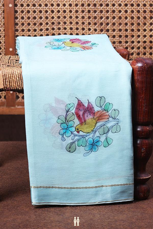 Chiffon Saree In Pastel Blue With Birds Hand Painted Design