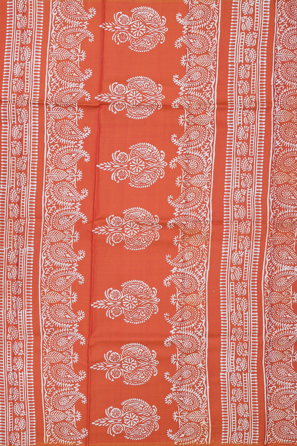 Printed Silk Saree In Rust Orange With Paisley Motifs