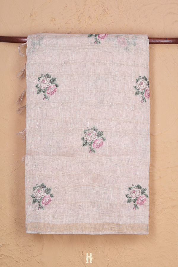 Linen Saree In Cream Color With Floral Embroidered Design