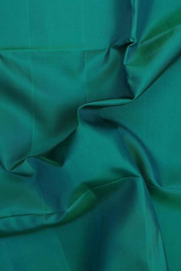 Soft Silk Saree In Plain Green With Contrast Border