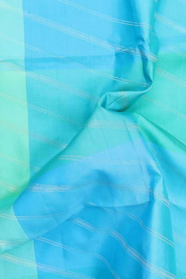 Soft Silk Saree In Green And Blue With Checks Design