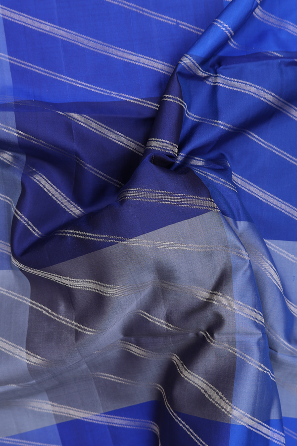 Soft Silk Saree In Shades Of Blue With Checks Design