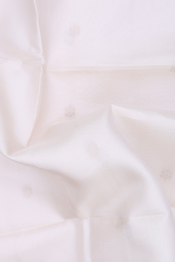 Soft Silk Saree In White With Zari Buttas