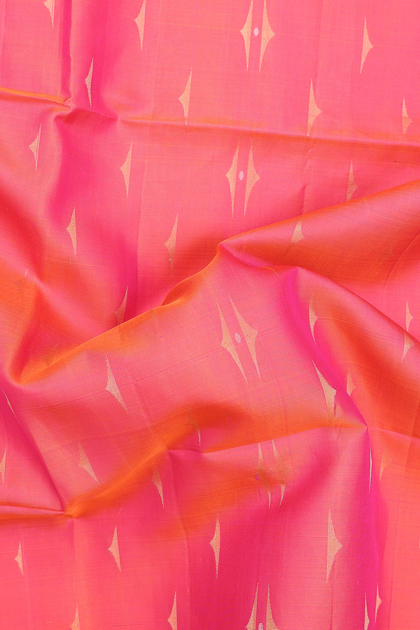 Soft Silk Saree In Coral Pink With Zari Buttas