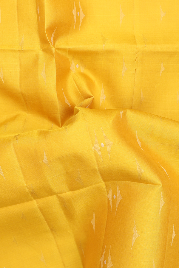 Soft Silk Saree In Saffron Yellow With Zari Buttas