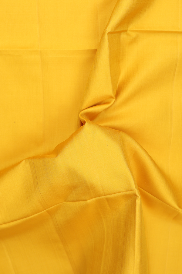 Soft Silk Saree In Honey Yellow With Temple Border