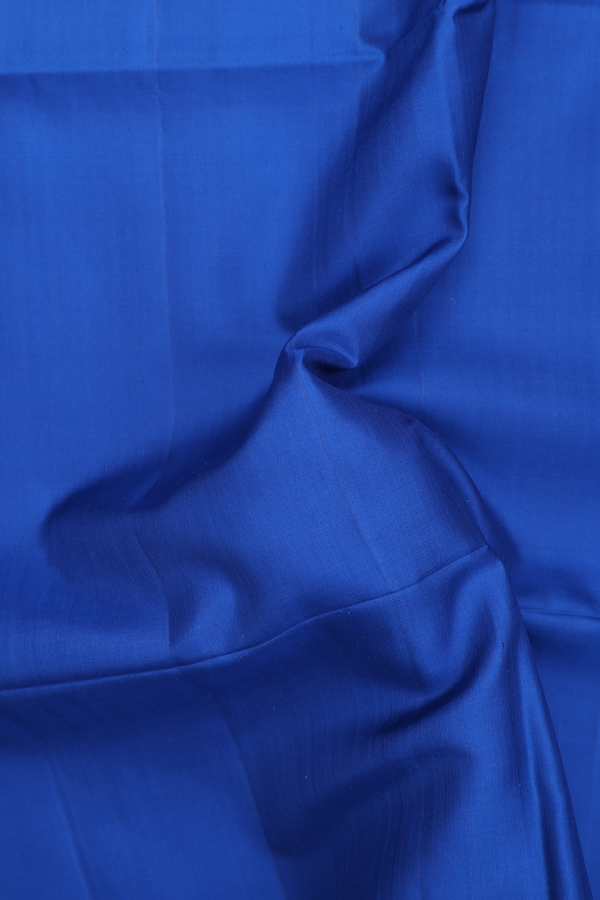 Soft Silk Saree In Plain Blue With Temple Border