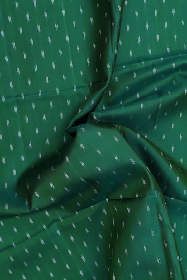 Soft Silk Saree In Emerald Green With Ikat Buttas