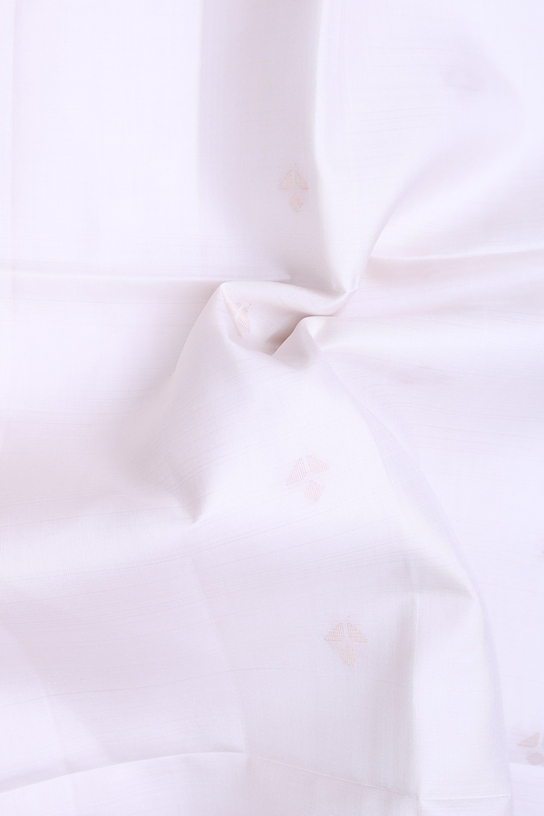 Soft Silk Saree In White With Zari Buttas