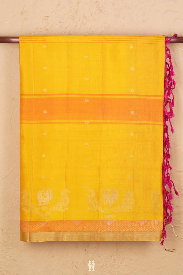 Soft Silk Saree In Shades Of Yellow Along Stripes With Buttas